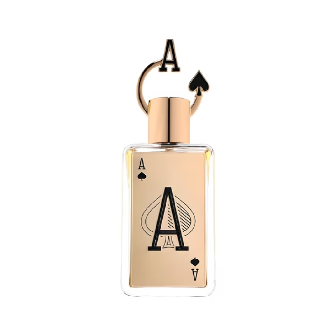 Perfume bottle with gold cap and clear body featuring a black 'A' design on a white background
