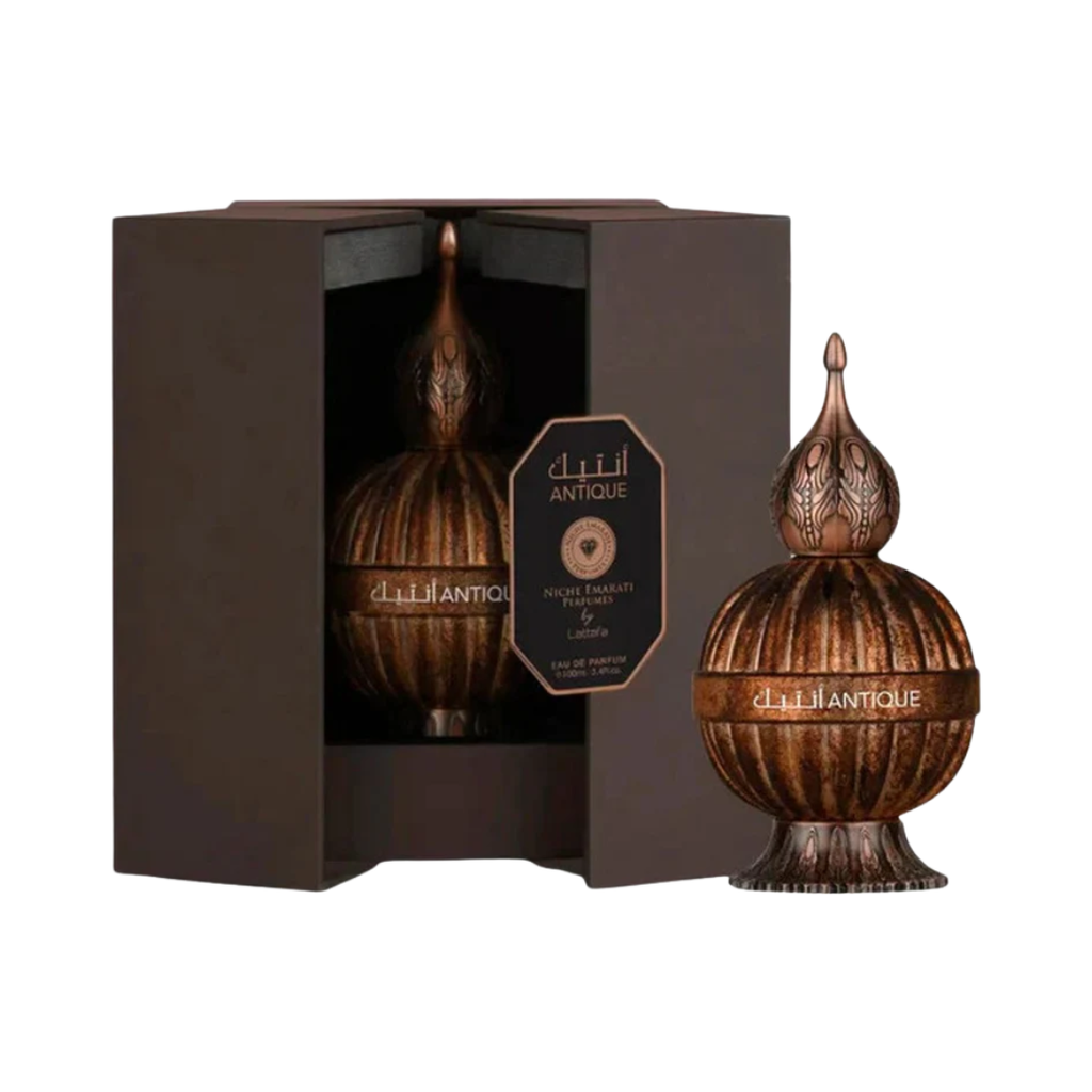 Antique by Lattafa 100ml EDP featuring a decorative amber-brown bottle and luxury packaging for men and women