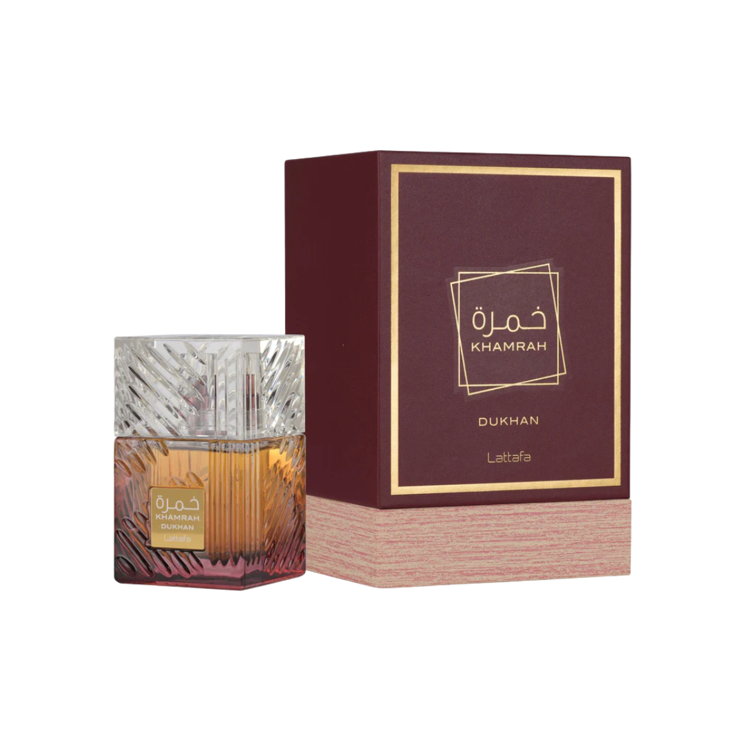Lattafa Khamrah Dukhan 100ml Eau de Parfum unisex perfume bottle with amber glass and textured cap shown alongside its matching burgundy box